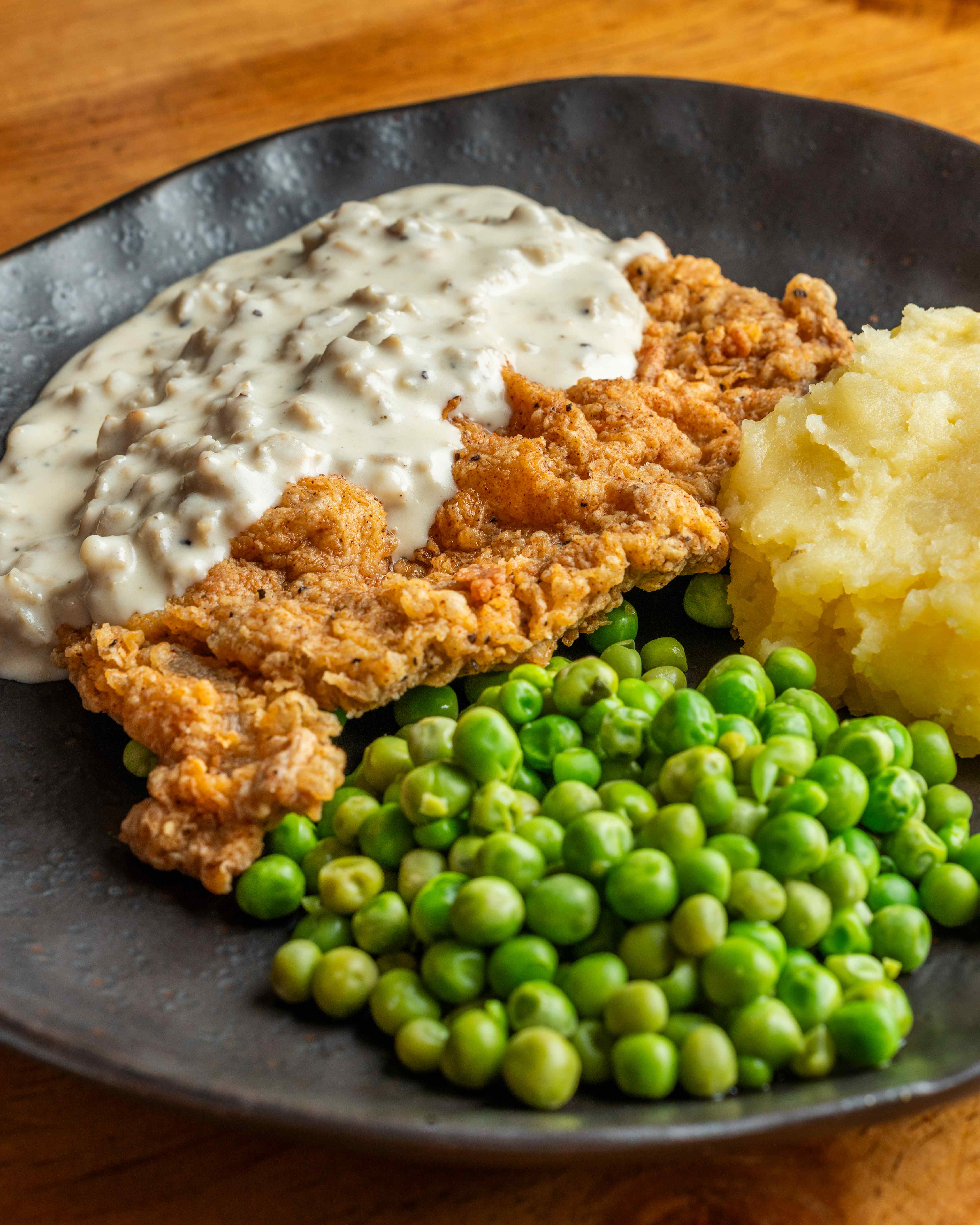 Country fried steak with mashed potatoes and gravy - Southern comfort food at Graceland Mong Kok